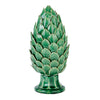 A green ceramic artichoke ornament on a white background