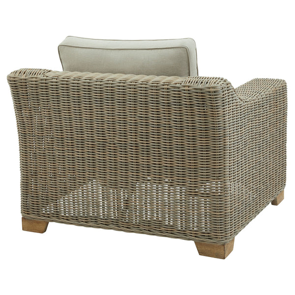 Chunky Rattan-Style Armchair with Plush Cushions & Subtle Metal Detailing