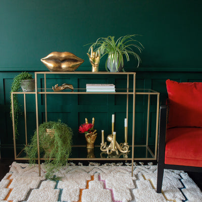 Elegant Gold Console Table with Tiered Shelves