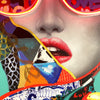 Close-up of an LED neon canvas artwork featuring a woman's face wearing neon red sunglasses