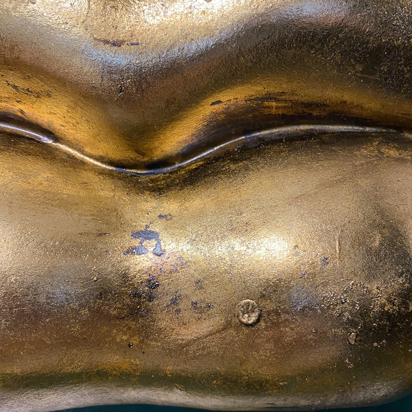 Close-up of a golden lips planter