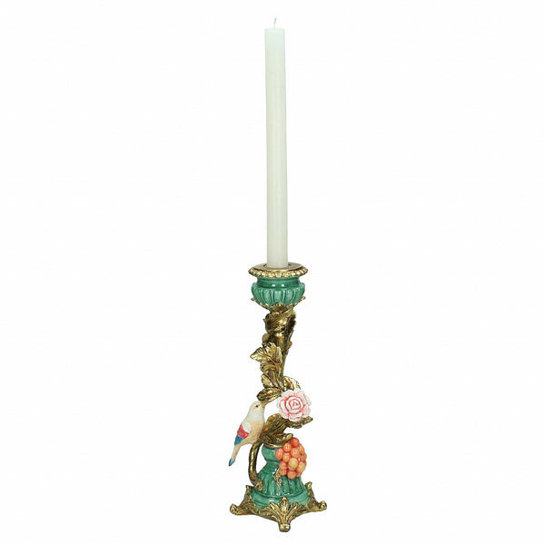 A perching bird candle holder with a white candle on a white background