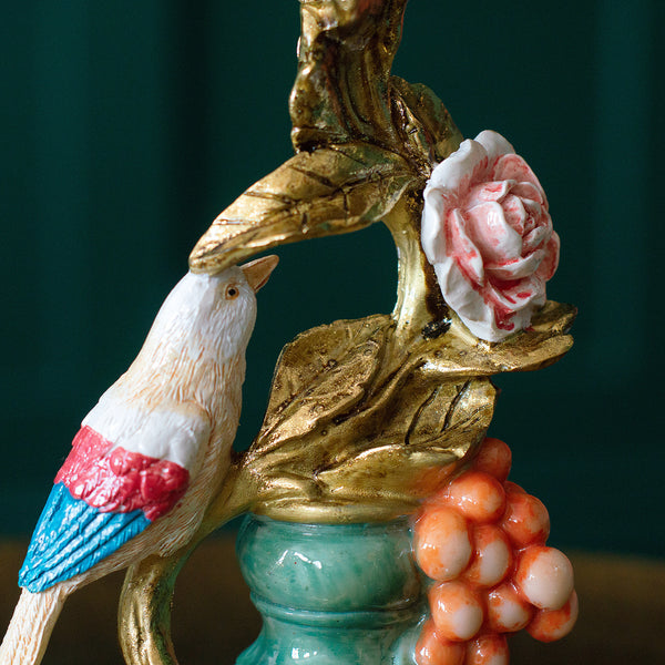 Close-up of a perching bird candle holder